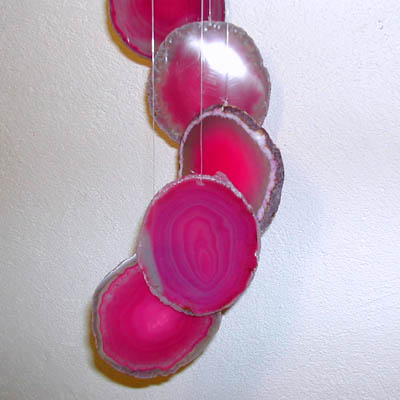 Scacciaguai fette di agata colore rosa